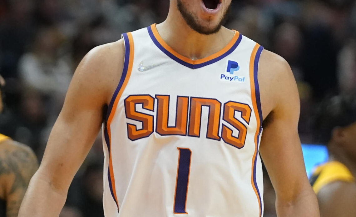 Booker leads Suns past Jazz 105-97 for 8th straight win
