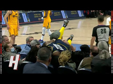 Ja Morant Dives into the Crowd