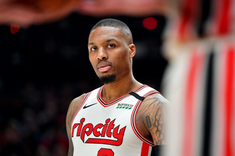 Report: Damian Lillard not joining Blazers' six-game road trip, to meet with a specialist about injury