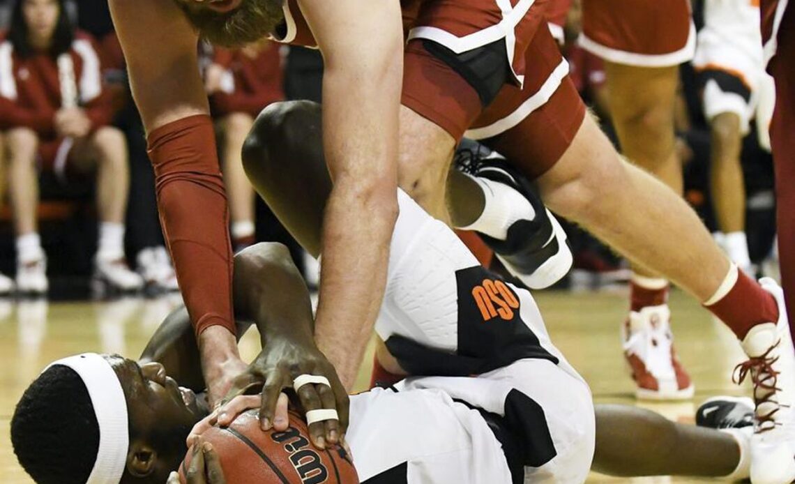 Kalib Boone, Cisse lead Oklahoma State past Oklahoma 64-55