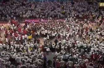 Madness ensues in Fayetteville as students storm the court after Arkansas upsets No. 1 Auburn, 80-76