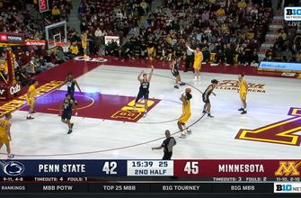 Minnesota's Eric Curry drains his first three-pointer of the year