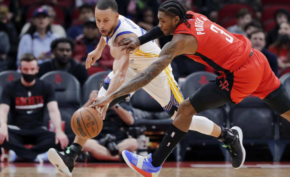 Steph Curry bests Kevin Porter Jr. in late duel as Warriors hold off Rockets