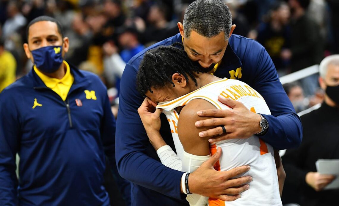 Michigan coach Juwan Howard comforts crying Tennessee star Kennedy Chandler after NCAA Tournament game