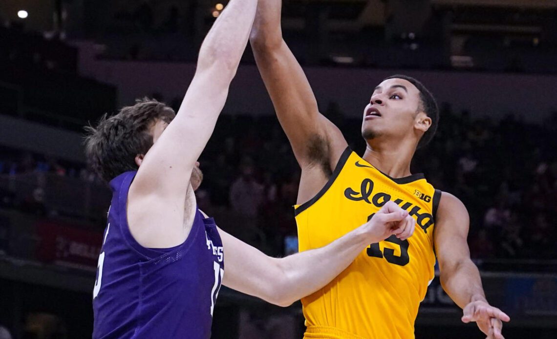 No. 24 Iowa routs Northwestern with record tourney showing