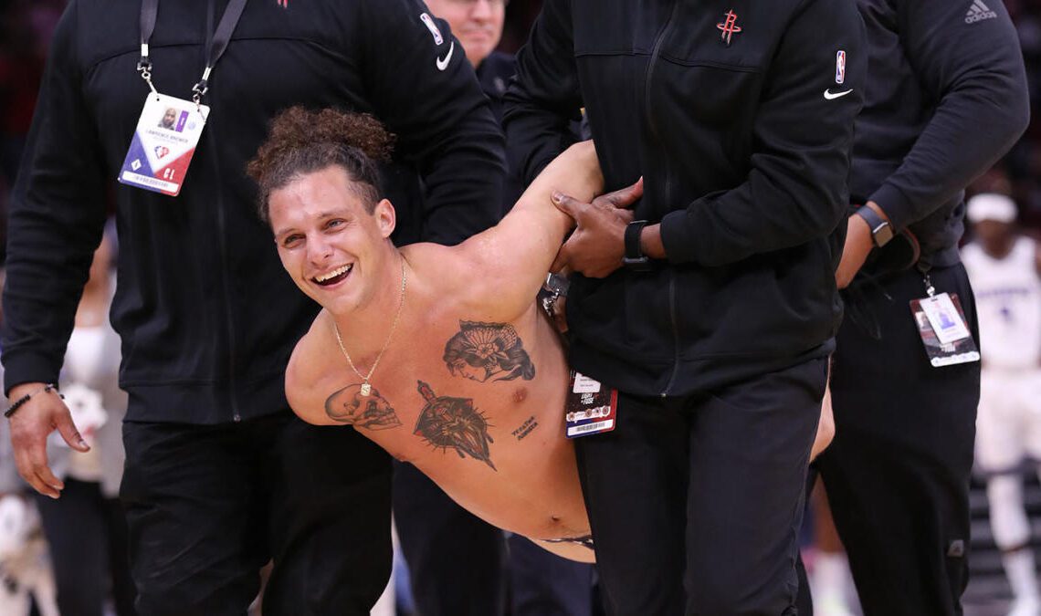 WATCH: Underwear-clad fan runs on court, dances, gets viciously tackled by security during Kings-Rockets game