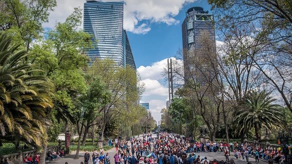 Crowds on Chapultepec Avenue looking towards city near Chapultepec Park, Mexico City, Mexico