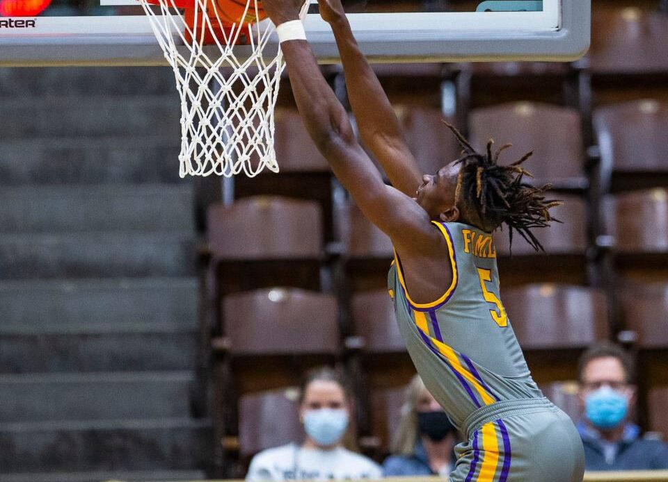 Legacy Early College's Coen Carr dunks during the LaLumiere vs. Legacy Early College NIBC Tournament basketball game Thursday, Jan. 6, 2022 at the LaPorte Civic Auditorium.