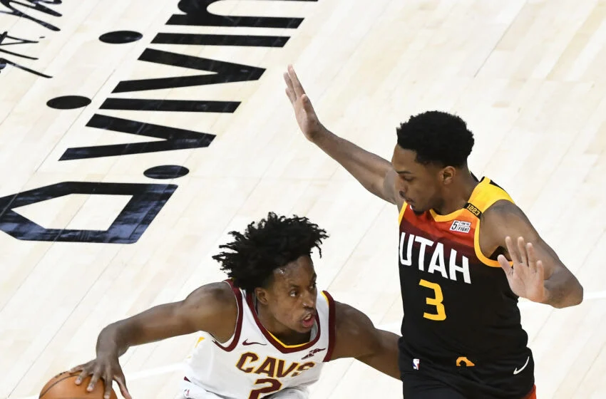 SALT LAKE CITY, UTAH - MARCH 29: Collin Sexton #2 of the Cleveland Cavaliers drives into Trent Forrest #3 of the Utah Jazz during a game at Vivint Smart Home Arena on March 29, 2021 in Salt Lake City, Utah. NOTE TO USER: User expressly acknowledges and agrees that, by downloading and/or using this photograph, user is consenting to the terms and conditions of the Getty Images License Agreement. (Photo by Alex Goodlett/Getty Images)
