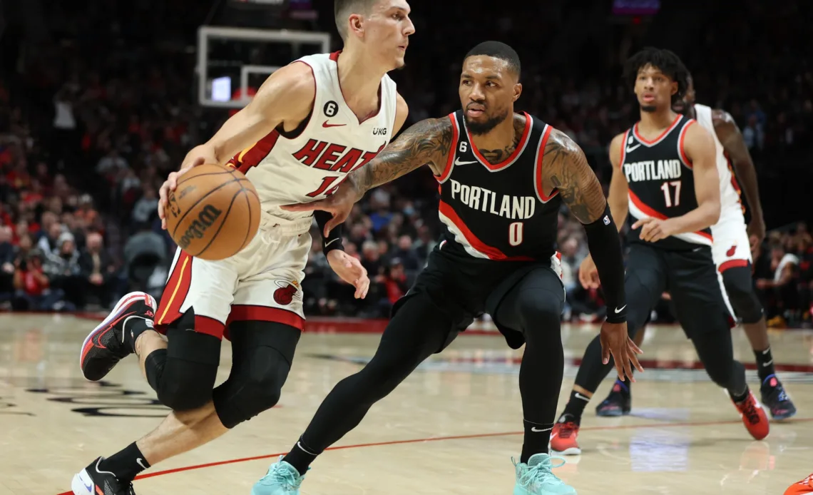 Blazers' Lillard strains calf, leaves in 3rd against Heat