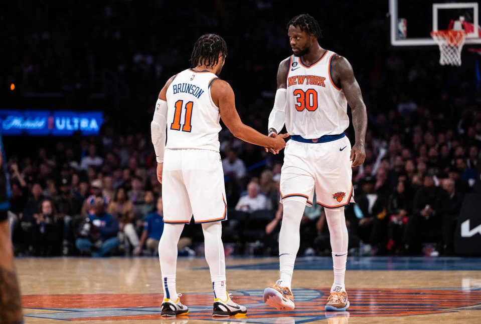 NEW YORK, NEW YORK - OCTOBER 24: Julius Randle #30 and Jalen Brunson #11 of the New York Knights celebrate after a basket during the third quarter of the game against the Orlando Magic at Madison Square Garden on October 24, 2022 in New York City. NOTE TO USER: User expressly acknowledges and agrees that,  by downloading and or using this photograph,  User is consenting to the terms and conditions of the Getty Images License Agreement. (Photo by Dustin Satloff/Getty Images)