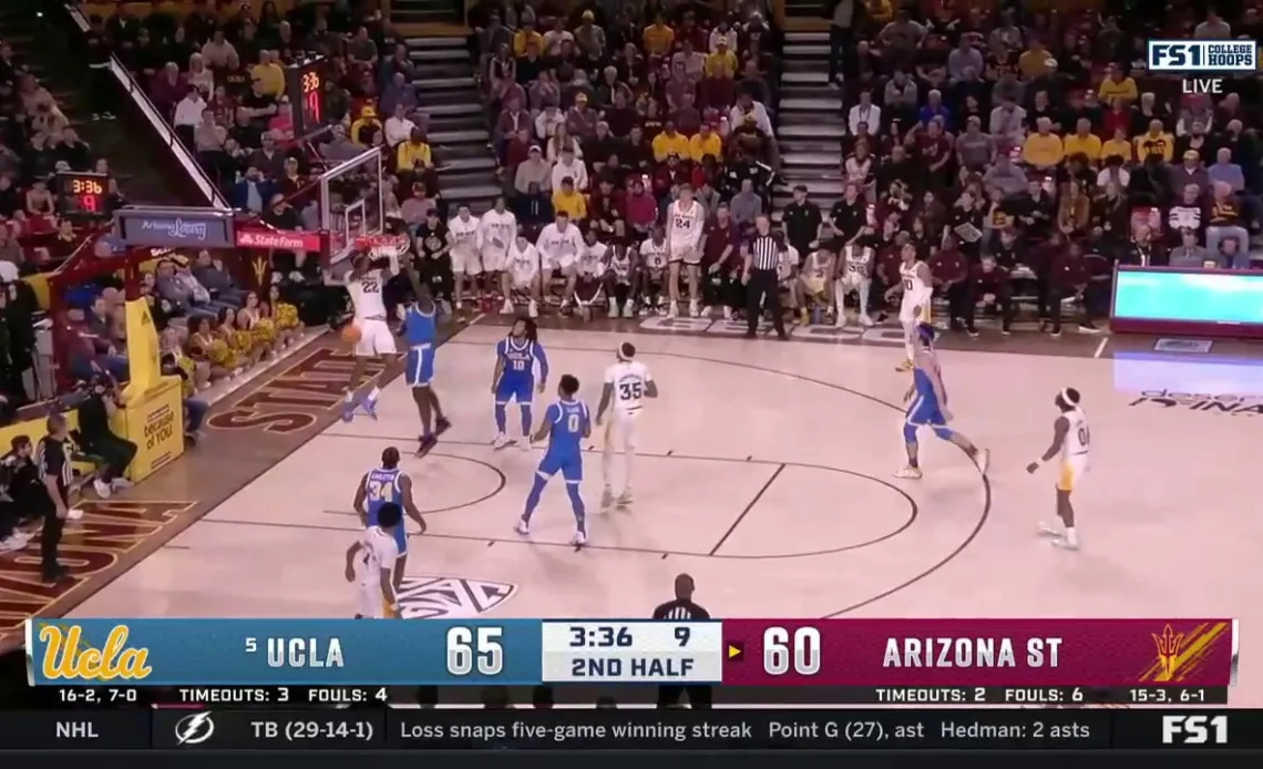 Arizona State's Warren Washington throws down a dunk to trim into UCLA's lead