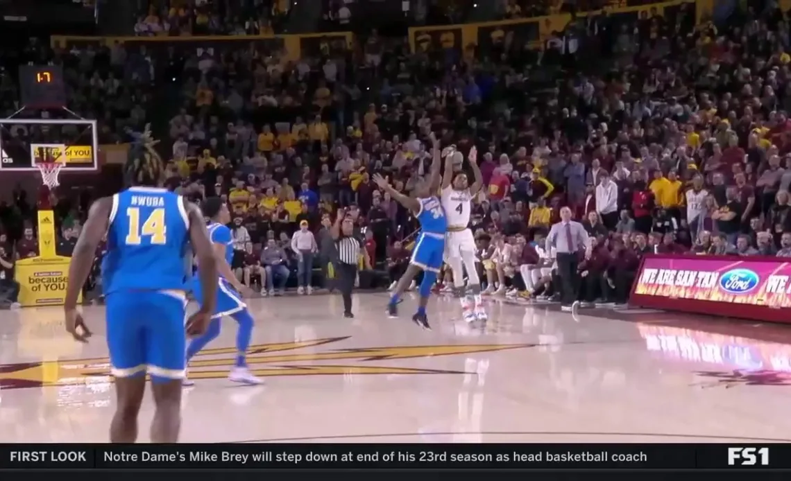 Desmond Cambridge Jr. buries a half-court shot to give Arizona State a 35-30 lead over No. 5 UCLA