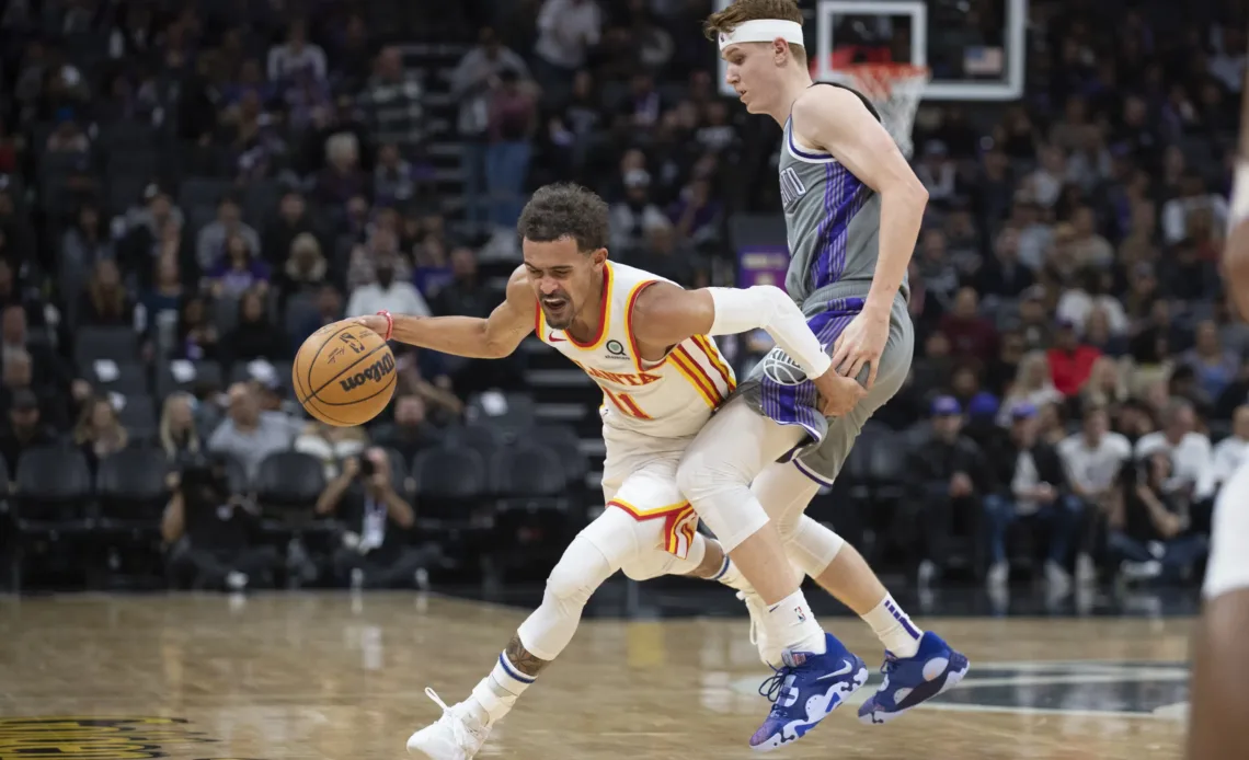 Hunter, Collins star as Hawks beat Kings 120-117