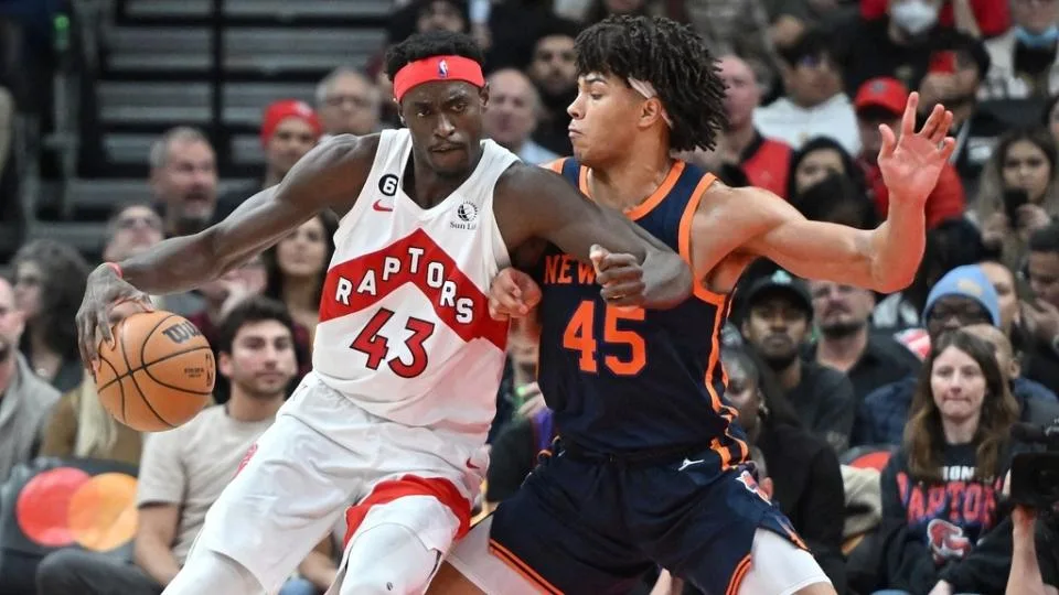 Jan 22, 2023; Toronto, Ontario, CAN; Toronto Raptors forward Pascal Siakam (43) tries to get past New York Knicks centere Jericho Sims (45) in the first half at Scotiabank Arena.