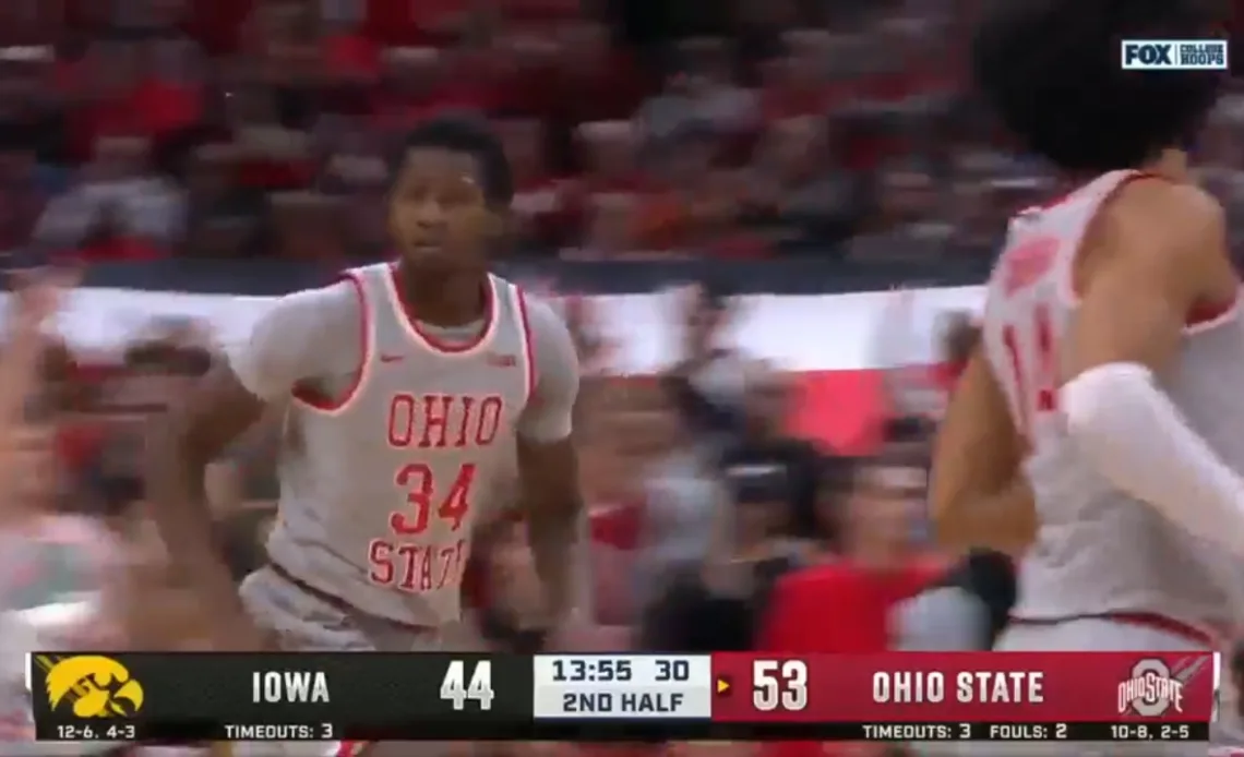 Ohio State's Felix Okpara comes through with a smooth dunk for the Buckeyes, extending the lead over Iowa