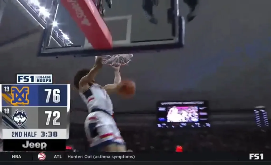 UCONN's Andre Jackson Jr. throws down a WILD fast-break jam to trim No. 13 Xavier's second-half lead