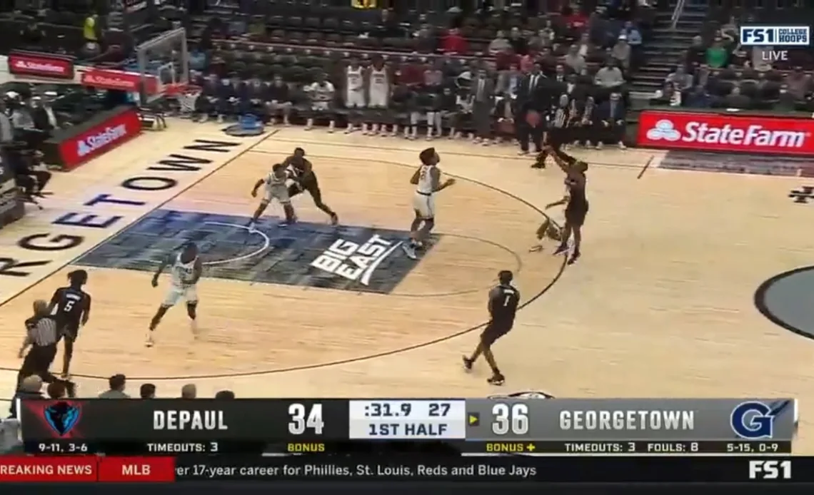 Umoja Gibson steals the ball and scores a HUGE 3-pointer to give Depaul the lead over Georgetown at halftime