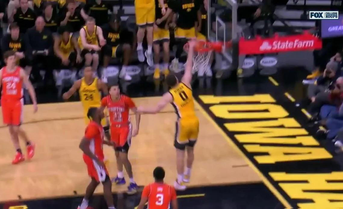 Filip Rebraca takes it home with this one-handed jam for Iowa against Illinois