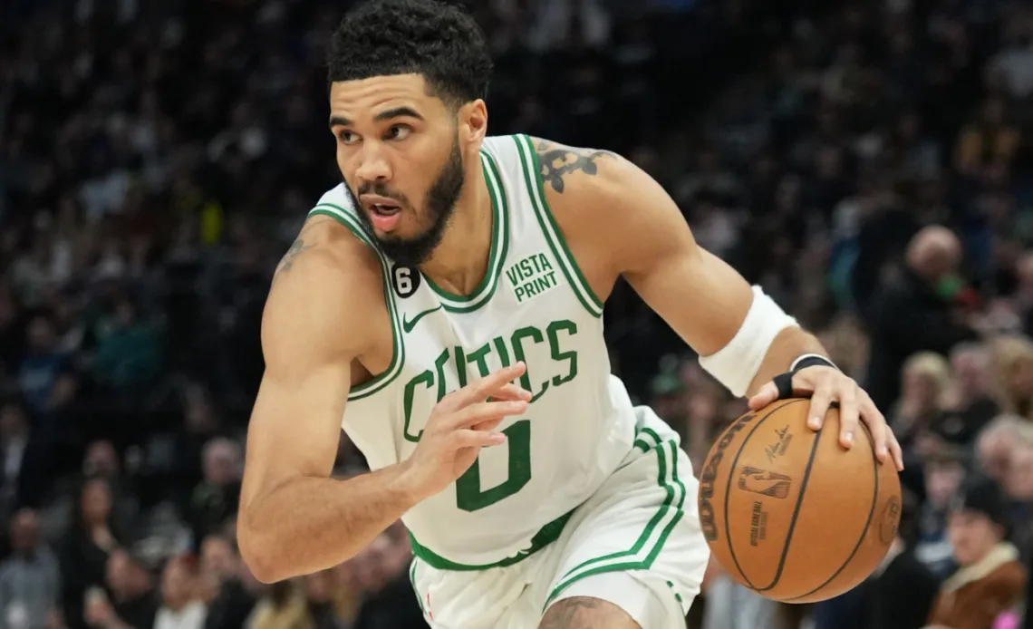 Celtics' Jayson Tatum takes nasty fall from flagrant foul after dunking on Wolves' Rudy Gobert