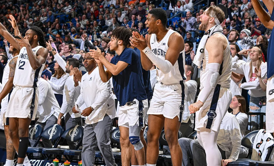 The Penn State bench celebrates during the game with Illinois. Behind a historic 41-point performance by Jalen Pickett, the Nittany Lions downed Illinois 93-81 on Tuesday night Feb. 14, 2023 in the Bryce Jordan Center.

Photo by Mark Selders