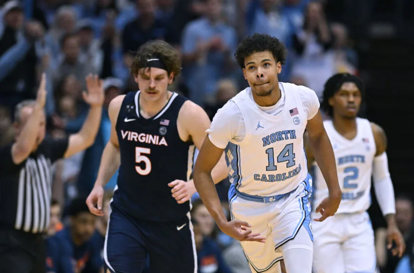 CHAPEL HILL, NORTH CAROLINA - FEBRUARY 25: Puff Johnson #14 of the North Carolina Tar Heels reacts after making a three-point basket against the Virginia Cavaliers during the first half of their game at the Dean E. Smith Center on February 25, 2023 in Chapel Hill, North Carolina. (Photo by Grant Halverson/Getty Images)