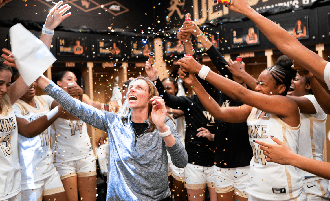 Megan Gebbia and the Women's Basketball team celebrating with confetti