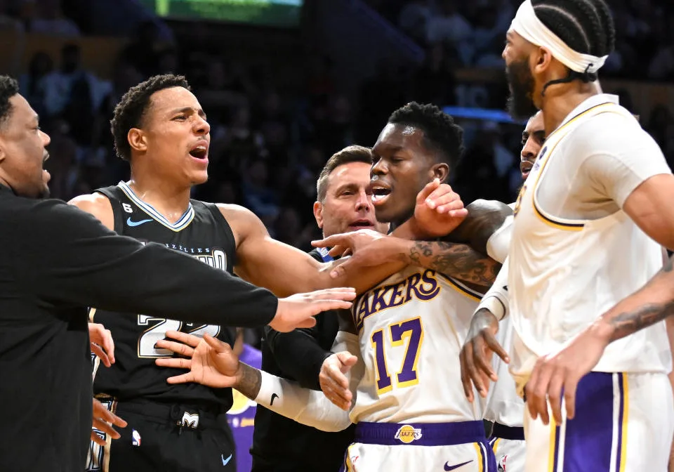 Anthony Davis, right, and Desmond Bane of the Grizzlies scuffle in the third quarter of Game 3. (Wally Skalij/Los Angeles Times via Getty Images)