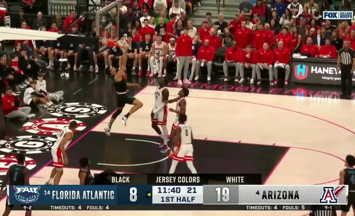 Florida Atlantic's Vladislav Goldin crashes the boards and finishes a monster dunk vs. Arizona