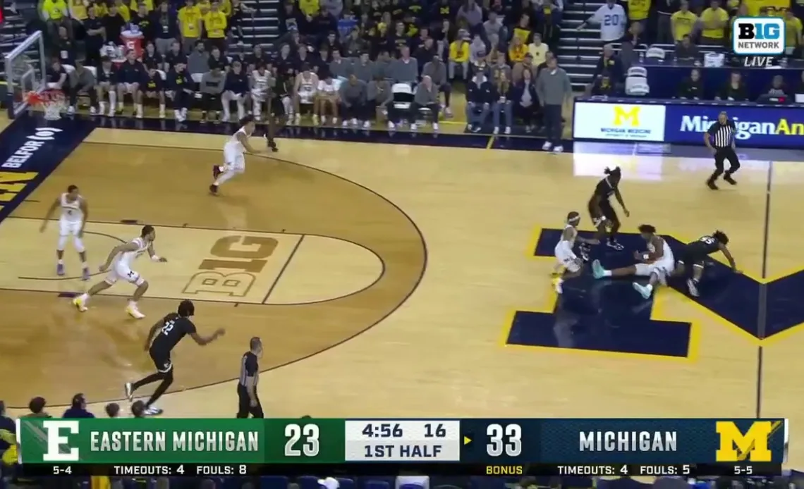 Michigan's Tarris Reed's incredible hustle leads to a Dug McDaniel bucket vs. Eastern Michigan