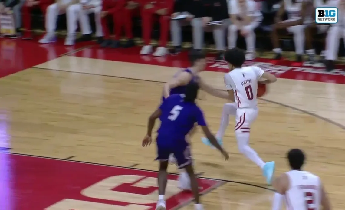 Rutgers' Derek Simpson pulls off a TOUGH and-1 floater vs. Stonehill