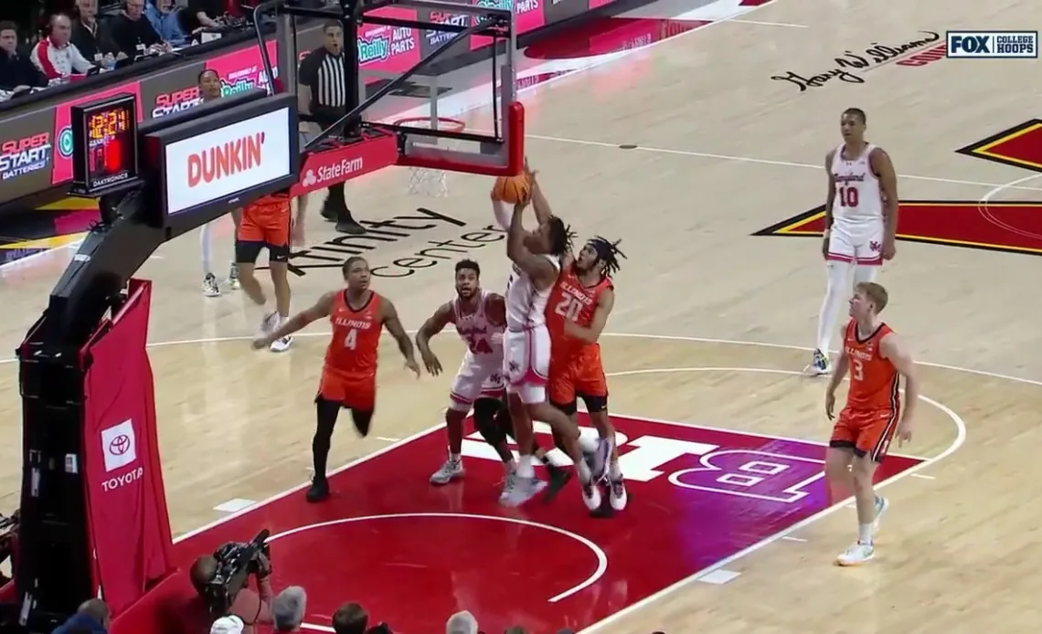 Maryland's DeShawn Harris-Smith makes a tough contested layup to trim Illinois' lead